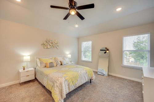 a bedroom with a bed and a ceiling fan at San Antonio Home with Fenced-In Yard Steps to Park! in San Antonio