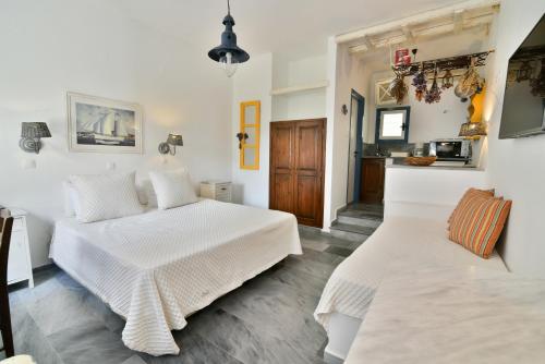Letto o letti in una camera di Golden Beach Studios & Suites