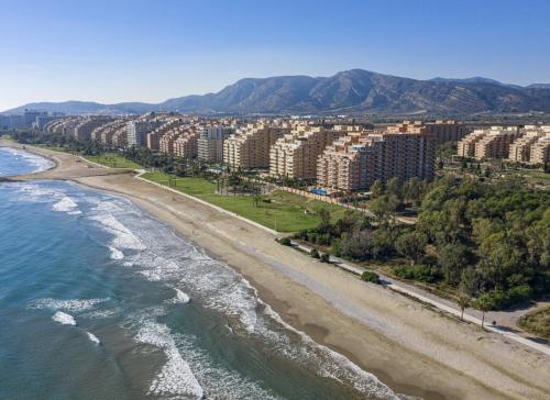 an aerial view of a beach and buildings at Apartalux Magic Diamond in Oropesa del Mar