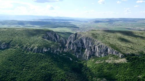 an aerial view of a mountain with trees at Radisson Blu Hotel, Cluj in Cluj-Napoca