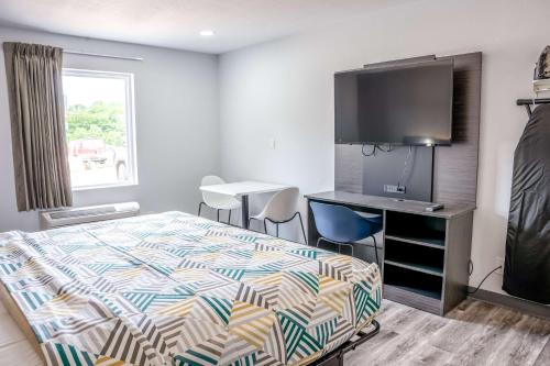 Studio 6 Claremore OKにあるベッド