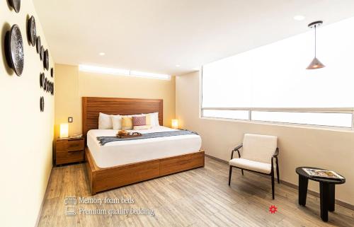Cama o camas de una habitación en Grand Chapultepec by Kukun