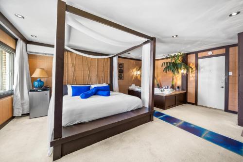 Postel nebo postele na pokoji v ubytování Hotel-Motel Coconut