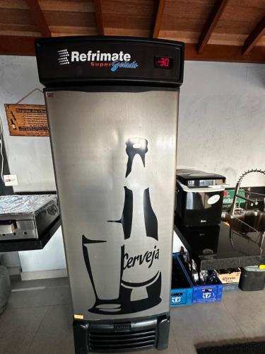 a blender with a black top on top of it at Casa Alto da Serra in Serra Negra
