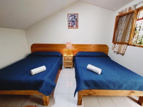 Postel nebo postele na pokoji v ubytování Hotel Miramar