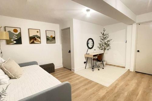 a bedroom with a bed and a desk in it at New Bensenville Home by O'Hare Airport with Indoor Pool, Sauna, and Arcade in Bensenville