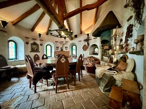 a large living room with a table and chairs at Rotunda U Václava in Šebkovice