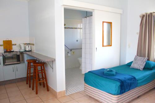Kuchyň nebo kuchyňský kout v ubytování Cooktown Motel
