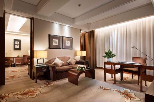 Posezení v ubytování Shanghai Yuehua Hotel