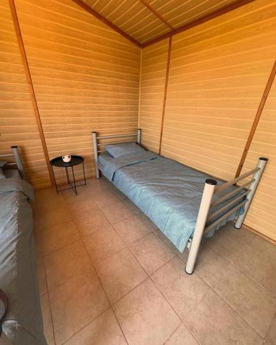 Postel nebo postele na pokoji v ubytování Oaza de Corbu