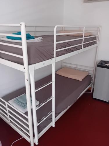 San Lorenzo Apartment tesisinde bir odada yatak veya yataklar