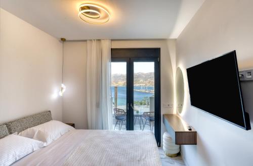 Ένα ή περισσότερα κρεβάτια σε δωμάτιο στο S&D Luxury Suites and Apartments