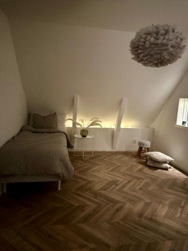 Katil atau katil-katil dalam bilik di Lyxigt hus i centrala Hässleholm