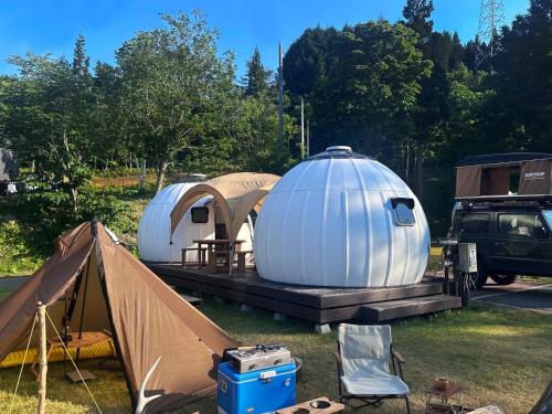 two domes and a tent on a trailer at Kuruma Asobi Adventure Field Appi - Camp - Vacation STAY 42095v in Hachimantai