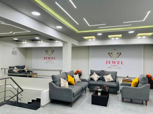 a lobby with couches and a waiting room at Elminya Compound in Al Minya
