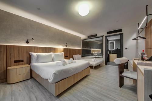 Postel nebo postele na pokoji v ubytování Noru Hotel Malta - Adults Only Hotel