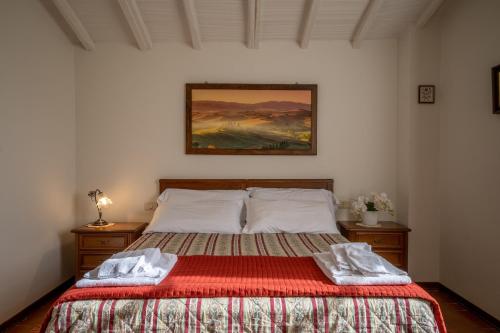 Ένα ή περισσότερα κρεβάτια σε δωμάτιο στο Agriturismo San Francesco