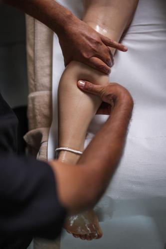 a bride getting her hands on the leg of her groom at Elexus Predeal in Predeal