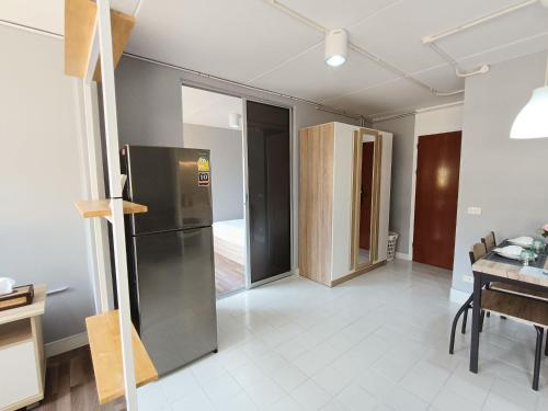 Kuchyň nebo kuchyňský kout v ubytování Impact DHIresidence at Muang Thong Thani