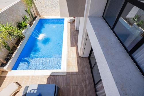 La alberca dentro o cerca de Aussie Beach Villa in Hammamet