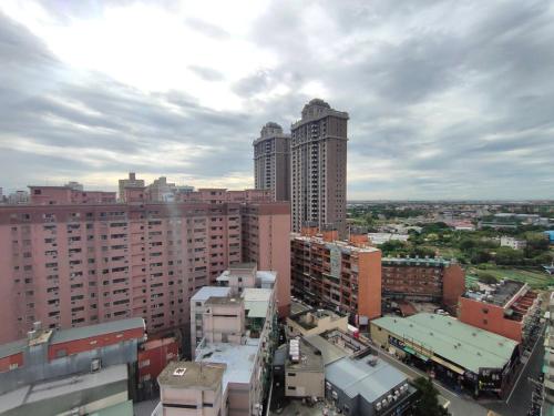 an aerial view of a city with tall buildings at Monarch Plaza Hotel in Taoyuan