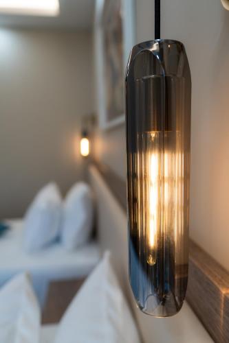 a black light fixture on a table in a room at Aurora Sofia in Sofia