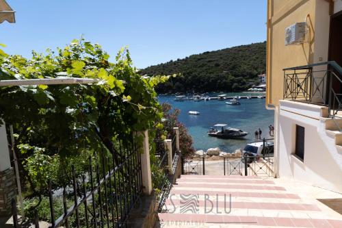 a view of a river from a balcony of a building at Endless Blu Apartments in Pyrgadikia