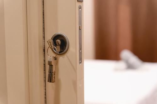 Postel nebo postele na pokoji v ubytování Ayma B&B