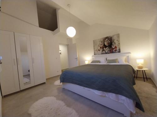 Postel nebo postele na pokoji v ubytování Apartment Amaterasu