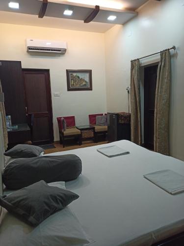 Katil atau katil-katil dalam bilik di Hotel Alka