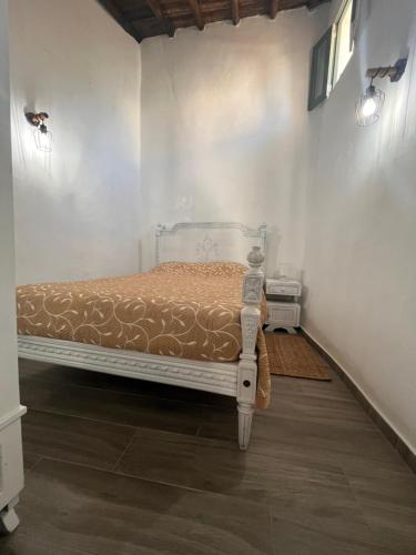 Ένα ή περισσότερα κρεβάτια σε δωμάτιο στο Casa Lu