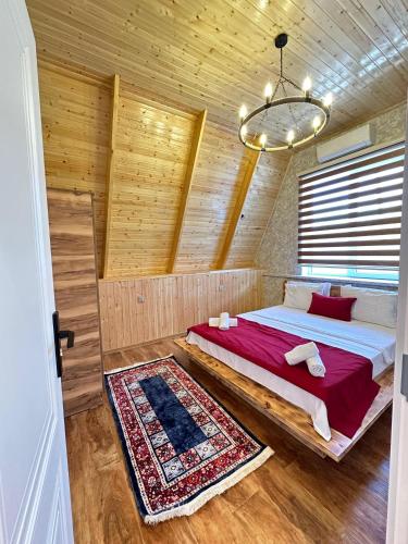 Ένα ή περισσότερα κρεβάτια σε δωμάτιο στο Dreamsville Chalet Gabala