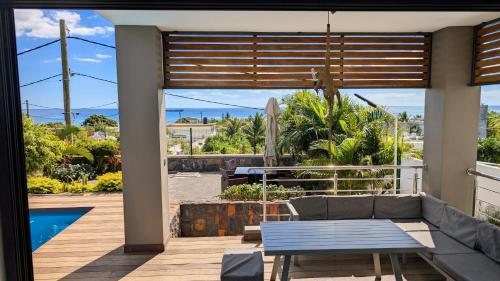 a view from the living room of a house at Maison des Sables/Pano in Pointe aux Sable