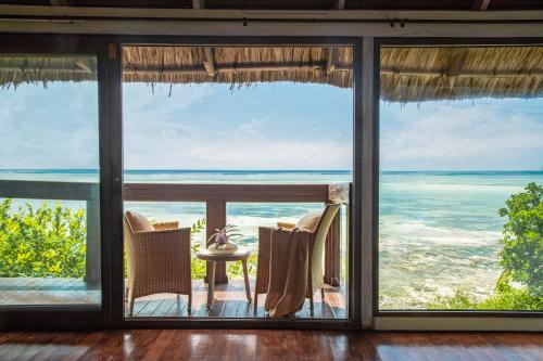 a room with a view of the ocean at Melia Zanzibar in Kiwengwa