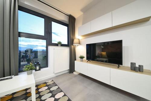 TV/trung tâm giải trí tại Apartments Wrocław! Urocze studio!