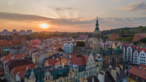 an aerial view of a city at sunset at Agroturystyka W oddali z balią in Międzylesie