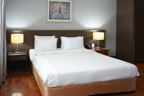 Katil atau katil-katil dalam bilik di Royal Suite Hotel Bangkok