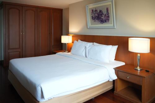 Katil atau katil-katil dalam bilik di Royal Suite Hotel Bangkok