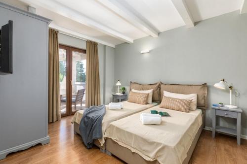 Postel nebo postele na pokoji v ubytování Villa Vira