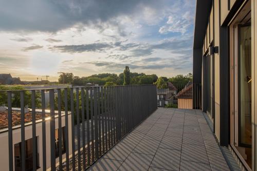 a balcony of a house with a fence at B5 Apartments in Karlsruhe