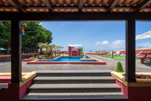 a view of a park with a playground and stairs at Villa Roque by An Island Apart in Calheta
