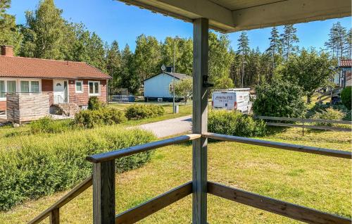a view of a yard from the porch of a house at 3 Bedroom Lovely Home In Alstermo in Alstermo