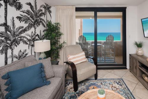 a living room with a couch and a table at The Surf Shack in Destin