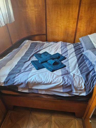 Postel nebo postele na pokoji v ubytování peniche logement