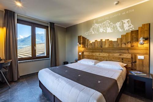 Postel nebo postele na pokoji v ubytování Monte Emilius