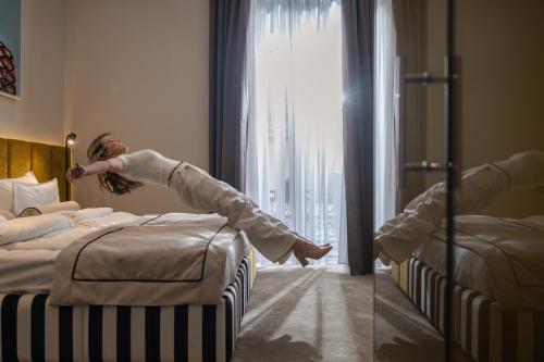 Postel nebo postele na pokoji v ubytování Maison Royale