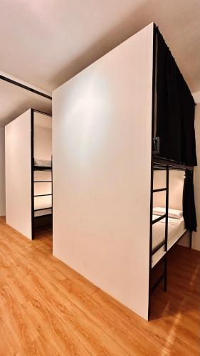 Cama o camas de una habitación en Puy-An, A Nomad Hostel