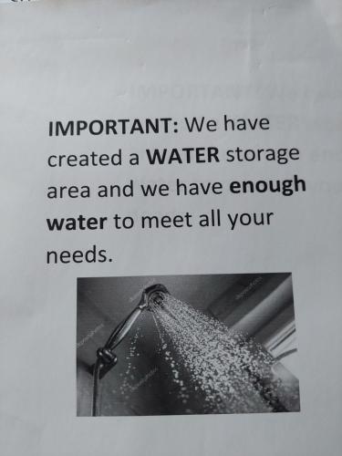 an image of an umbrella with the words important we have created a water storage area at Porto Katsiki House in Athanion