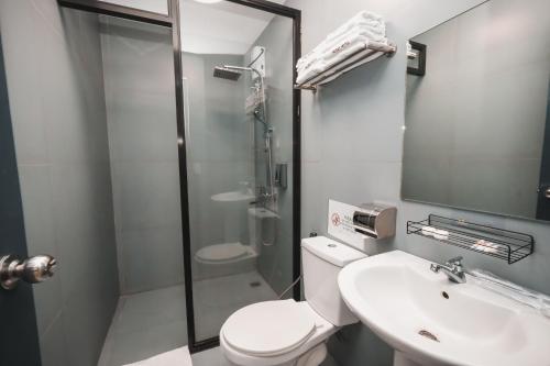 Koupelna v ubytování Rosey Hotel