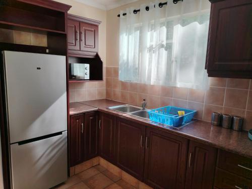 Kuchyň nebo kuchyňský kout v ubytování Gooderson Leisure Natal Spa Self Catering and Timeshare Resort